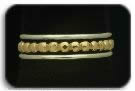 14kt. Gold Bead with two Sterling Silver Thins